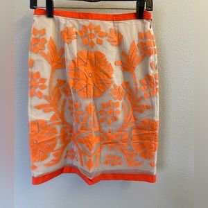 Women’s orange & tan skirt